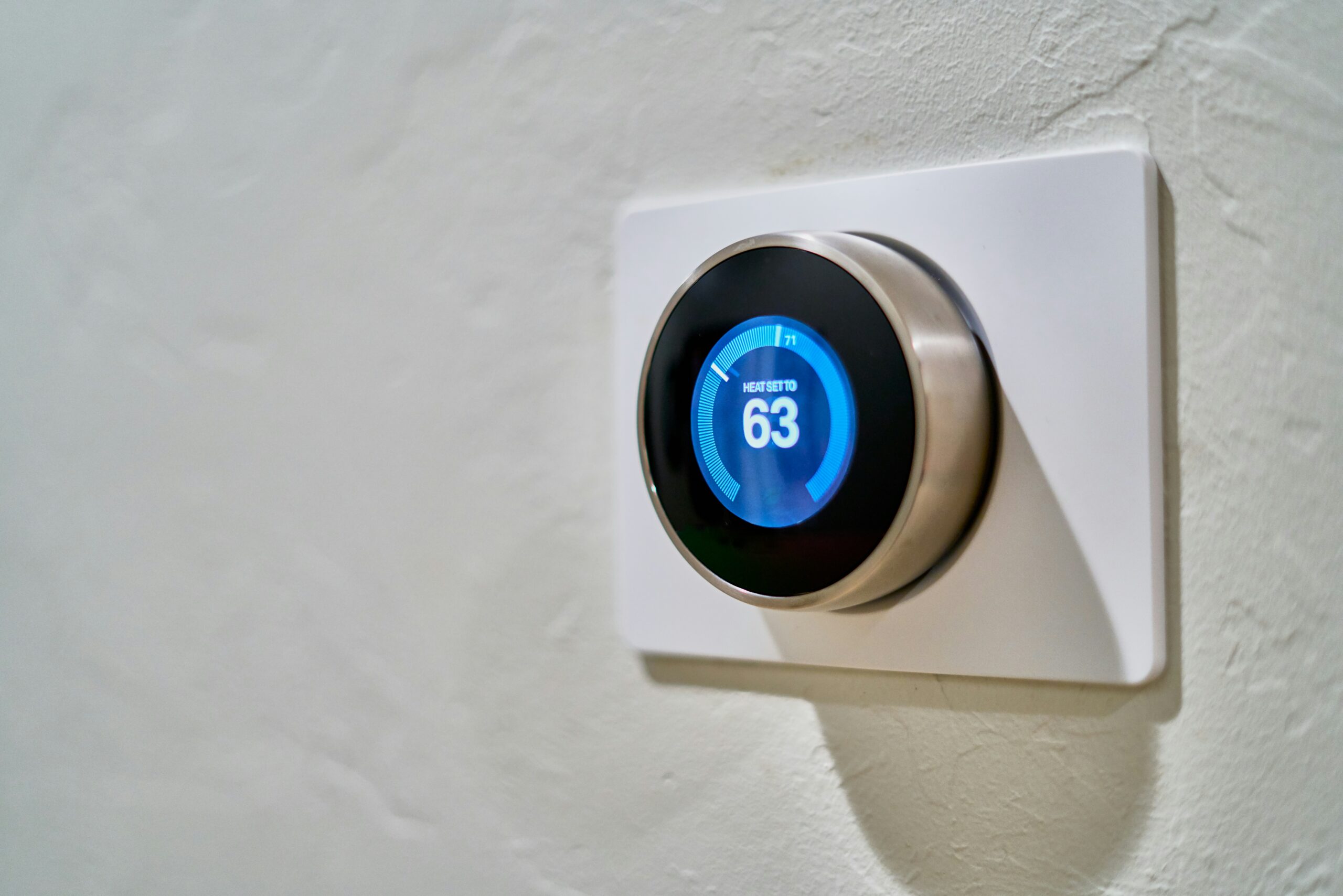 Air conditioning & Heating, EFA displaying a gray Nest thermostat displaying at 63